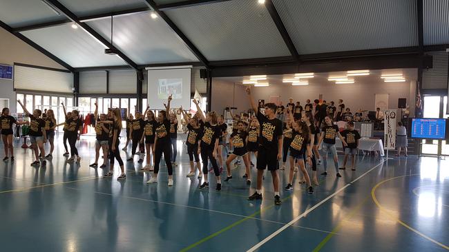 Chisholm Catholic College students preparing for their musical.