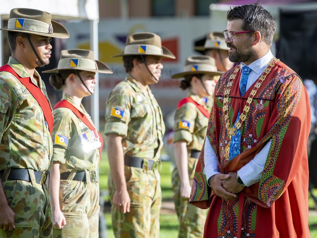 Alice Springs Mayor Matt Paterson inspects the honour guard during the Australia Day flag raising and citizenship ceremony on the council lawns. Picture Mark Brake