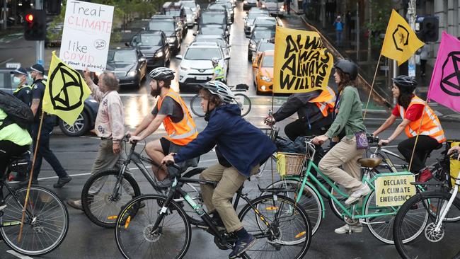 The group of cyclists blocked off major intersections in the city. Picture: David Crosling