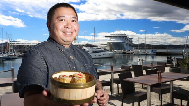 Chef Sam Pang from Asian Gourmet on the Pier, holding some shao mai dim sum. Picture: LUKE BOWDEN