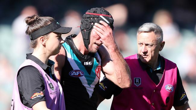 Port Adelaide’s Brad Ebert cops another big head knock. Picture: Sarah Reed