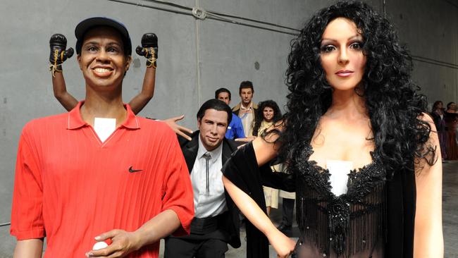 Waxworks of Tiger Woods, John Travolta and Cher await transportation after The Hollywood Wax Museum auctioned all of its figures. Picture: Paul Harris/Getty Images