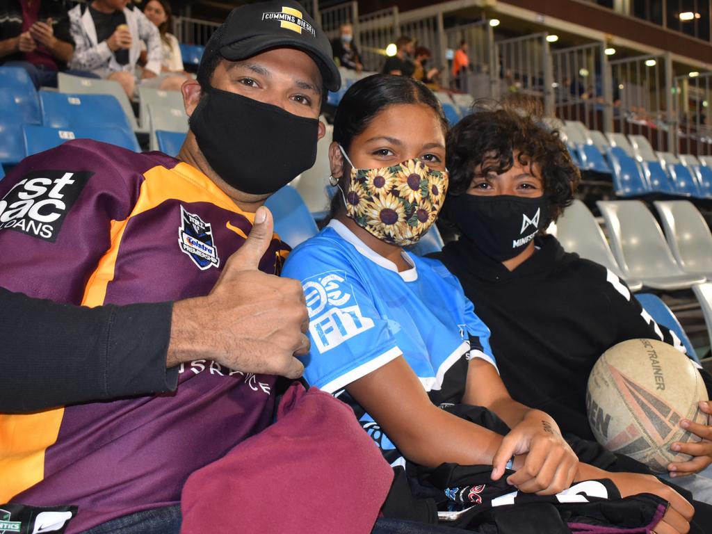 Broncos fan Leo Morrison (left), Panthers supporter Lailani Morrison and Broncos boy George Morrison at the Manly Sea Eagles v Sydney Roosters NRL semi final match at BB Print Stadium, Mackay, September 17, 2021. Picture: Matthew Forrest