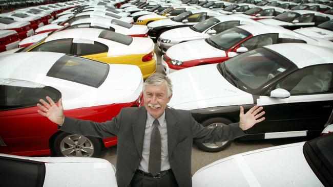 Former Holden boss Peter Hanenberger with a shipment of Holden Monaro coupes to be sold as Pontiacs in the USA, in 2003. Picture: Darren Seiler.