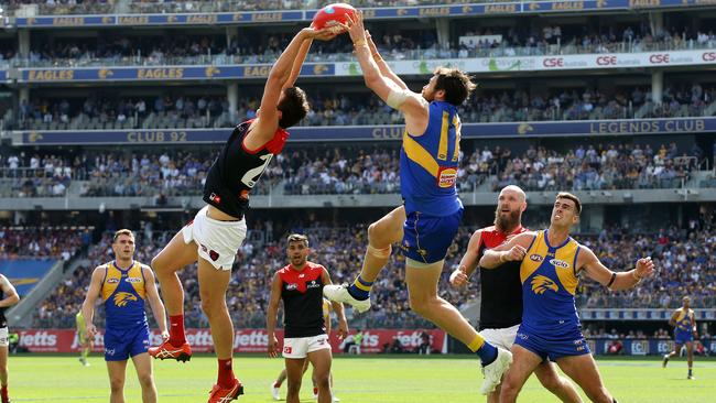 Josh Kennedy marks over Sam Weideman. Picture: Michael Klein