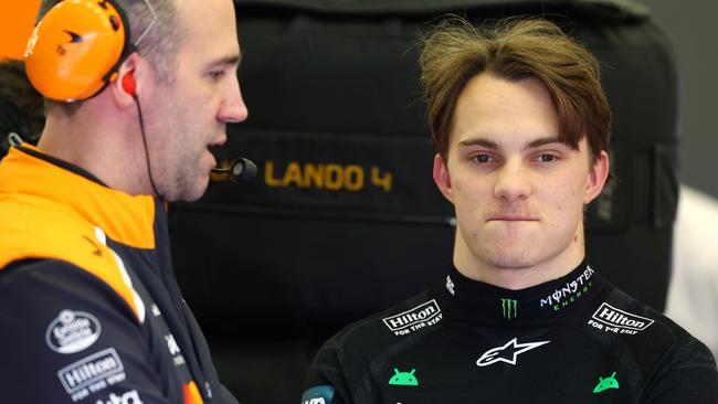 BAHRAIN, BAHRAIN - FEBRUARY 27: Oscar Piastri of Australia and McLaren and Tom Stallard, Race Engineer of McLaren tal  during day two of F1 Testing at Bahrain International Circuit on February 27, 2025 in Bahrain, Bahrain. (Photo by Clive Rose/Getty Images)