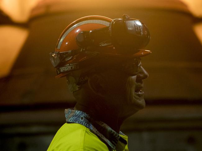 An employee in front of a steel furnace at BlueScope Steel Ltd. Port Kembla steelworks in Port Kembla, Australia, on Friday, Feb. 9, 2024. The world's two biggest miners, BHP Group Ltd. and Rio Tinto Group, are teaming up in a bid to develop Australia's first electric-smelting furnace, in what could prove an important step toward slashing emissions in the steel-making process. Photographer: Brent Lewin/Bloomberg