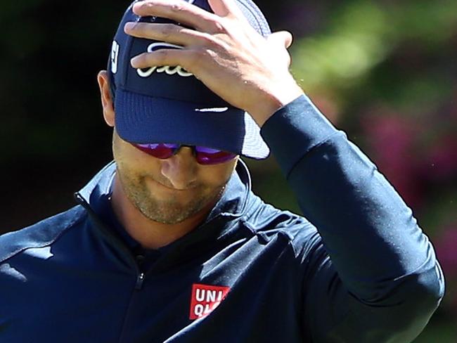 AUGUSTA, GEORGIA - APRIL 07: Adam Scott of Australia reacts on the 13th green during the first round of the 2016 Masters Tournament at Augusta National Golf Club on April 7, 2016 in Augusta, Georgia. (Photo by Andrew Redington/Getty Images)