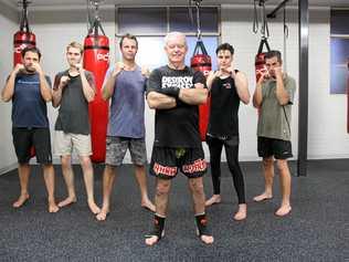 KICKING UP A STORM: Chief instructor of Lismore PCYC Kickboxing Club, Mark Greig (centre), with athletes John Gordon, Oscar Fountain, John McKie, Quentin Paine and David Auvisch at the newly-refurbished purpose-built gym. Picture: Alison Paterson