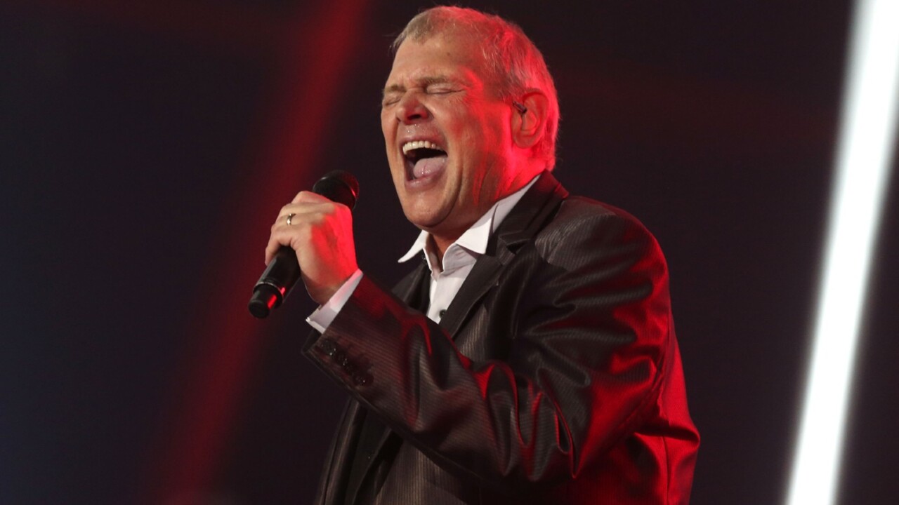 First pictures of John Farnham since oral cancer surgery