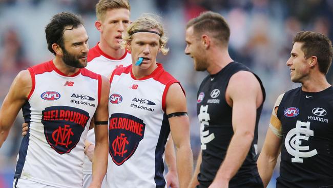 Jordan Lewis and Marc Murphy exchange words at the MCG. Picture: Getty Images