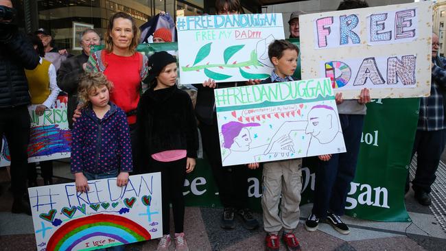 The couple’s children made signs to support their father. Picture: NCA NewsWire/ Gaye Gerard