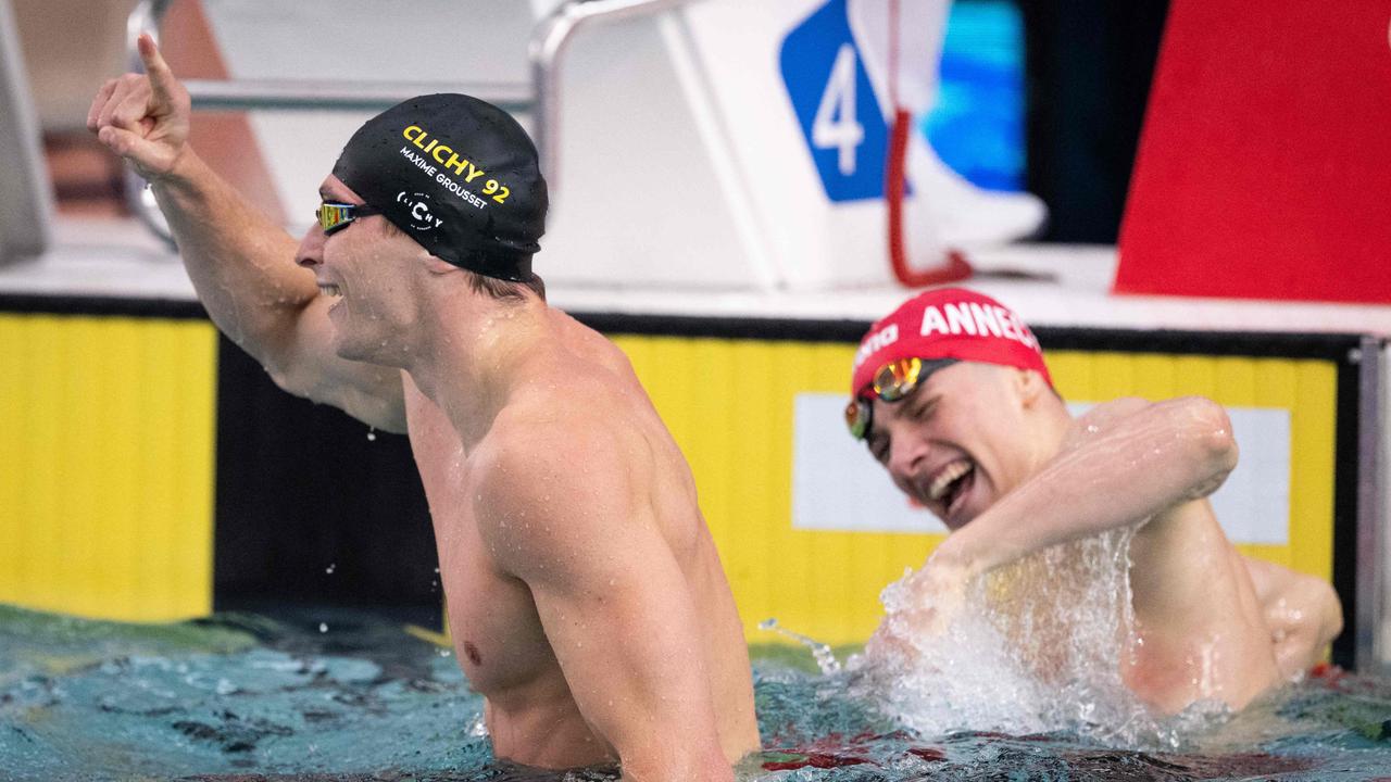 France's Rafael Fente Damers (R) celebrates after competing in the men's 100m freestyle final during the French swimming championships. (Photo by SEBASTIEN BOZON / AFP)