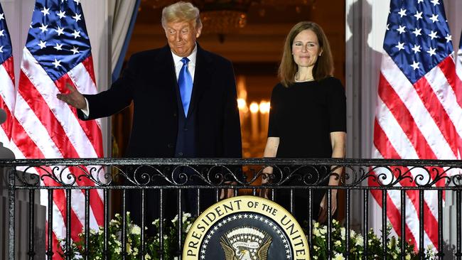 Donald Trump and Amy Coney Barrett at the White House in Washington after she was sworn in as a US Supreme Court Associate Justice on Wednesday. Picture: AFP