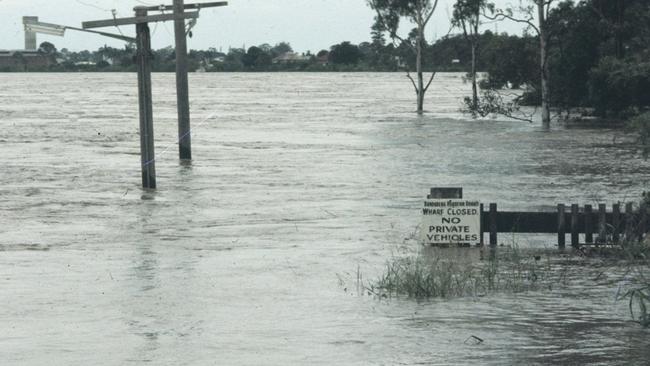 Burnett River wharf in flood, 1971. A powerful reminder of the river’s force during severe rain weather. Source: QLD Places