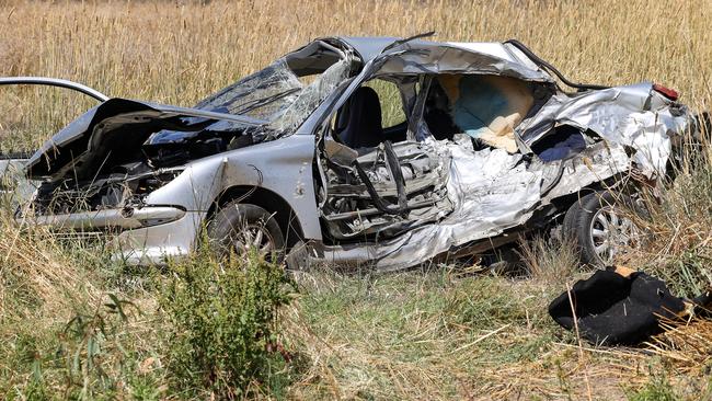 The car in which four people died at Pine Lodge after it went through a stop sign and collided with a ute and trailer. Picture: Ian Currie