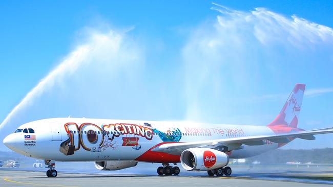 AirAsia X marked its 10 year birthday with a specially decorated Airbus flight into the Gold Coast from Kuala Lumpur yesterday morning. The plane was greeted with a fire service water tower celebration on the tarmac at Gold Coast Airport.