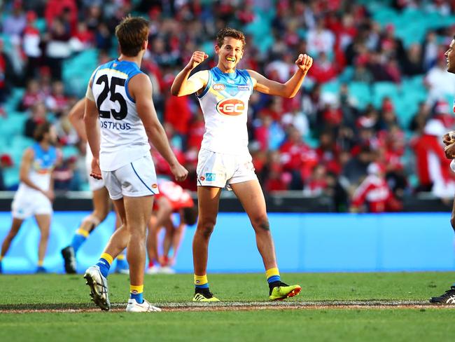 Wil Powell celebrates victory during the round 18 AFL match between the Sydney Swans and the Gold Coast Suns at Sydney Cricket Ground on July 21, 2018 in Sydney, Australia. Picture: Mark Kolbe/Getty Images.