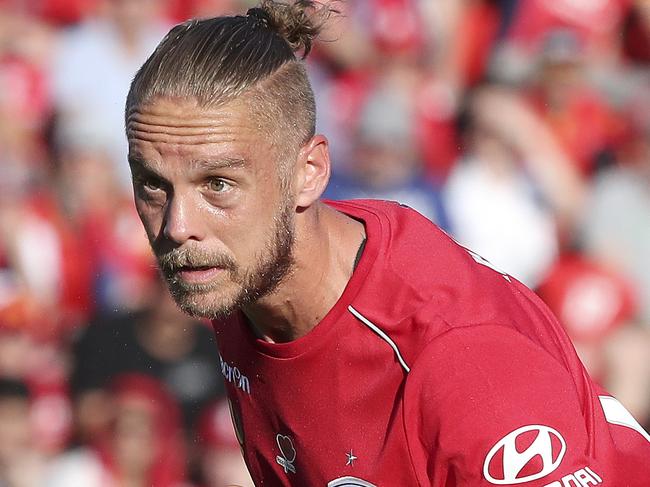 SOCCER - 11/11/18 - A-LEAGUE - Adelaide United v Perth Glory at Coopers Stadium. Ken Ilso Larsen heads the ball. Picture SARAH REED