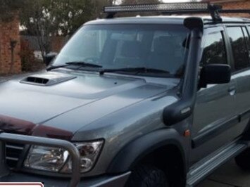 The 2004 silver Nissan Patrol.