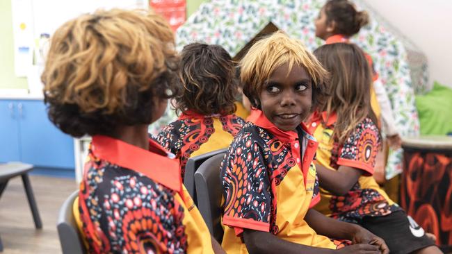 Students at Yipirinya School participating in a drumming program, playing musical chairs. Picture: Nic Liengme