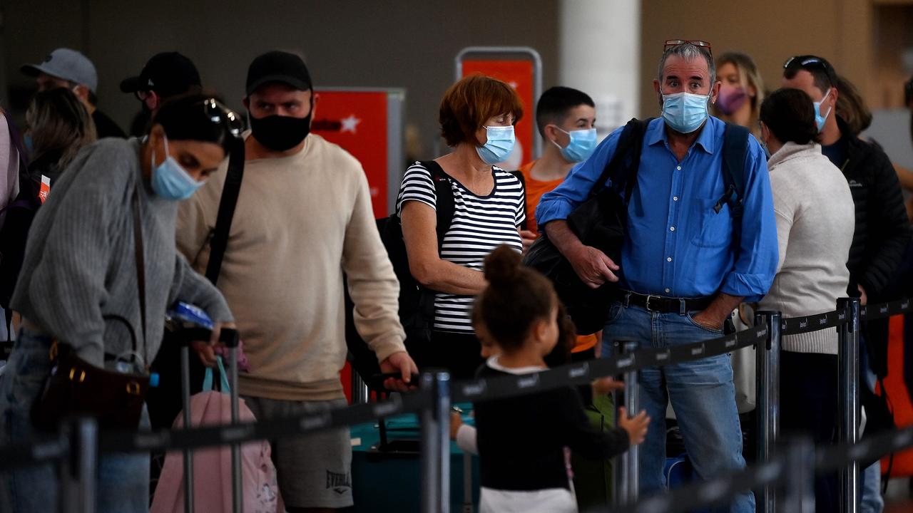 People are seen wearing face masks at Sydney Airport. Picture: NCA NewsWire/Bianca De Marchi