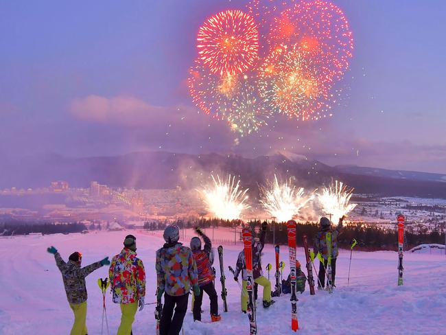 TOPSHOT - This picture taken on December 2, 2019 and released from North Korea's official Korean Central News Agency (KCNA) on December 3, 2019 shows skiers watching fireworks during a ceremony to mark the completion of the construction of the township of Samjiyon County. (Photo by STR / various sources / AFP) / South Korea OUT / ---EDITORS NOTE--- RESTRICTED TO EDITORIAL USE - MANDATORY CREDIT "AFP PHOTO/KCNA VIA KNS" - NO MARKETING NO ADVERTISING CAMPAIGNS - DISTRIBUTED AS A SERVICE TO CLIENTS / THIS PICTURE WAS MADE AVAILABLE BY A THIRD PARTY. AFP CAN NOT INDEPENDENTLY VERIFY THE AUTHENTICITY, LOCATION, DATE AND CONTENT OF THIS IMAGE --- /