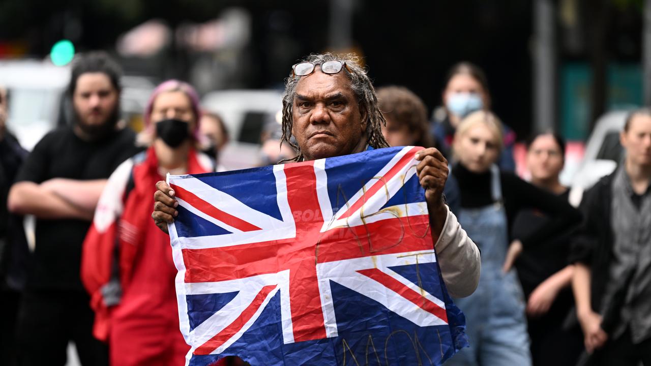 The group burned a British flag during the rally. Picture: NCA NewsWire / Dan Peled