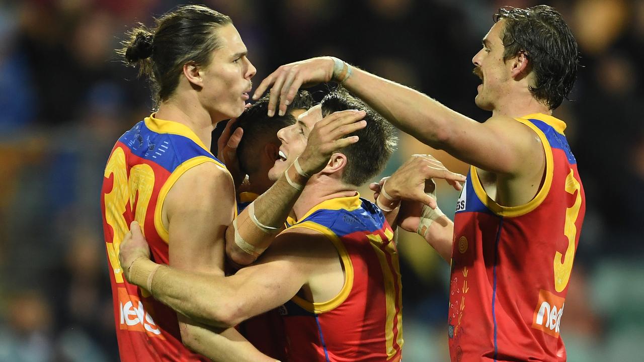 Eric Hipwood celebrates with teammates after kicking a major. Picture: Getty Images