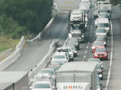 FIERY TRUCK CRASH: M1 Traffic chaos northbound.. after a B Double ran into 3 stationary roadworks trucks on M1 near Warnervale just after 2am. 5 men taken to hospital including the truck driver with shoulder injury and he will undergo mandatory testing. Picture: Twitter / Steve Hart