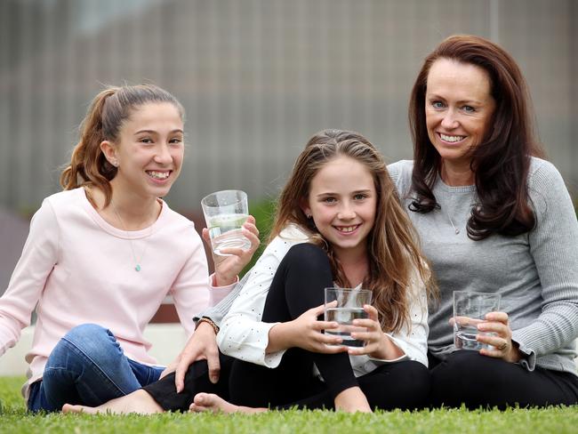 Rachel Zappia and her daughters Talia, 13, and Ava, 9, save water by having four minute showers. Picture: Sam Ruttyn