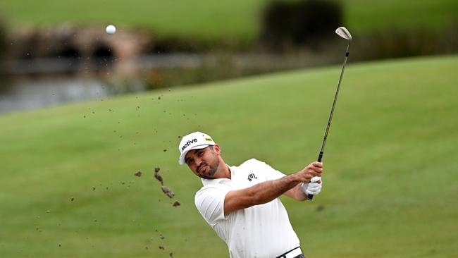 Jason Day plays a shot during the first round of the Australian PGA Championship. Picture: Bradley Kanaris/Getty Images