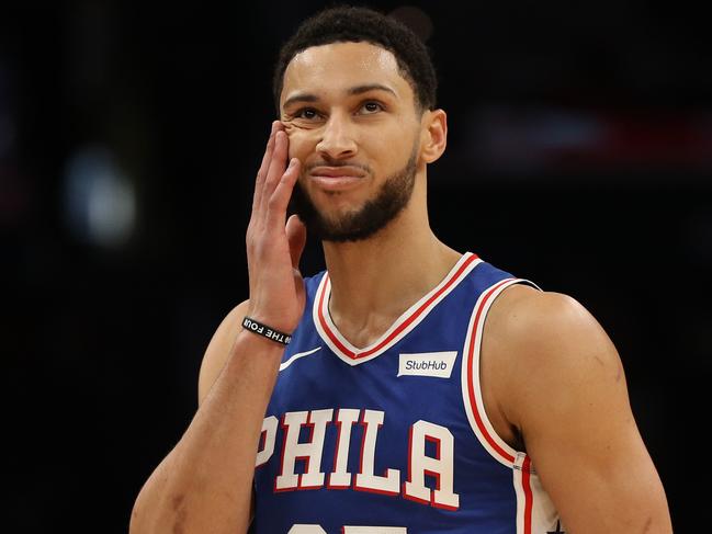 WASHINGTON, DC - DECEMBER 05: Ben Simmons #25 of the Philadelphia 76ers reacts against the Washington Wizards during the first half at Capital One Arena on December 5, 2019 in Washington, DC. NOTE TO USER: User expressly acknowledges and agrees that, by downloading and or using this photograph, User is consenting to the terms and conditions of the Getty Images License Agreement. (Photo by Patrick Smith/Getty Images)