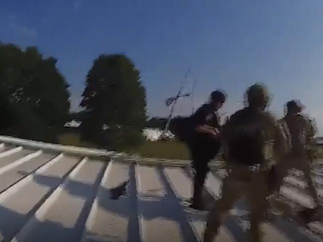 Bodycam video from Trump assassination attempt shows police confronting Thomas Crooks on roof. Picture: Supplied