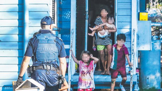 Children caught up in a police raid in St George. Picture: The Courier-Mail