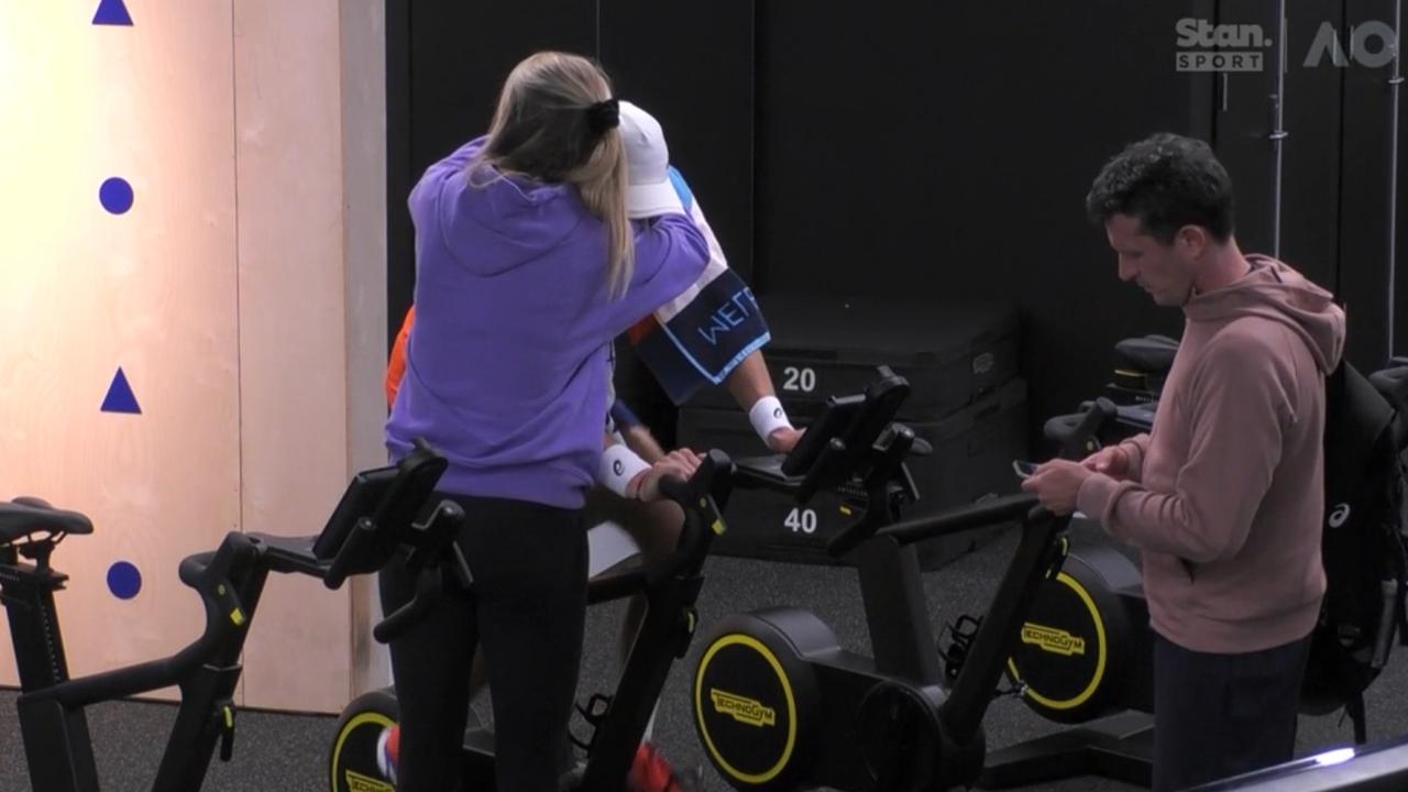 Katie Boulter consoles Alex de Minaur after his five-set loss to Andrey Rublev.