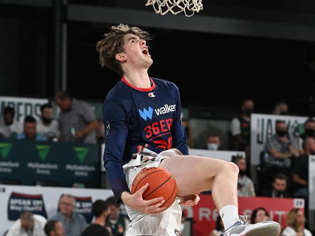 Lachlan Olbrich of the Adelaide 36ers dunks the ball during warm up during the round nine NBL match between Tasmania Jackjumpers and Adelaide 36ers at MyState Bank Arena on January 28, 2022, in Hobart, Australia. Picture: Steve Bell/Getty Images