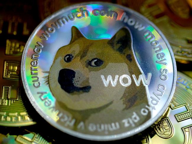 KATWIJK, NETHERLANDS - JANUARY 29: In this photo illustration, visual representations of digital cryptocurrencies, Dogecoin and Bitcoin are arranged on January 29, 2021 in Katwijk, Netherlands.  (Photo by Yuriko Nakao/Getty Images)