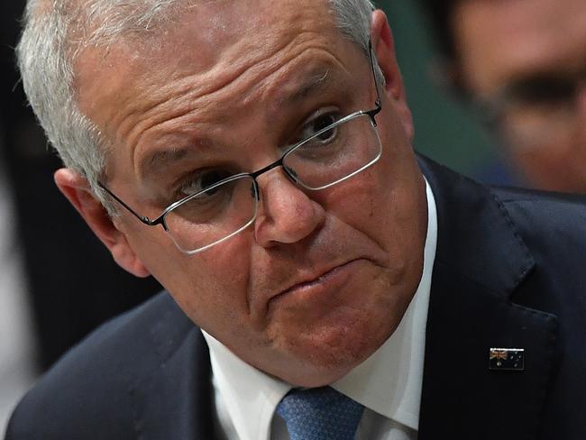 CANBERRA, AUSTRALIA - MAY 11: Prime Minister Scott Morrison during Question Time in the House of Representatives at Parliament House on May 11, 2021 in Canberra, Australia. Treasurer Josh Frydenberg will tonight deliver the Morrison government's third budget with an increased focus on women, with almost $354 million in funding allocated for women's health. Treasurer Frydenberg also outlined more than $10 billion in spending on major infrastructure projects across Australia aimed to help create local jobs and boost productivity in the COVID-affected national economy. Aged care will receive more than $10 billion over the next four years, in direct response to the findings of the Royal Commission into Aged Care Quality and Safety.  (Photo by Sam Mooy/Getty Images)