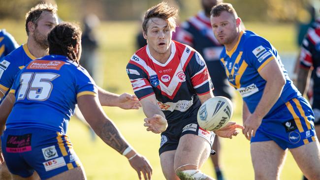 Toby Huxley sets up a Rams try. Pics by Julian Andrews.