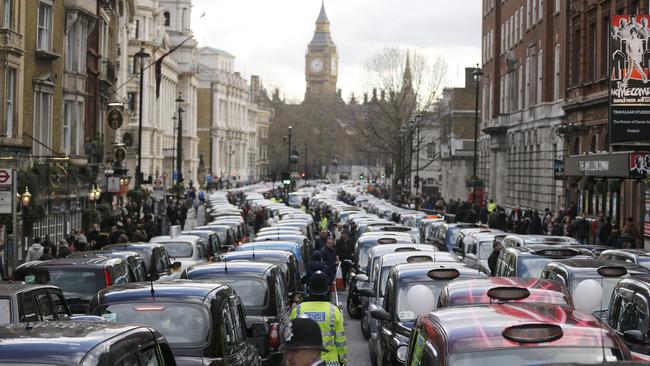 London’s taxis are also concerned about unfair competition from services such as Uber. Picture: AP Photo/Frank Augstein, File