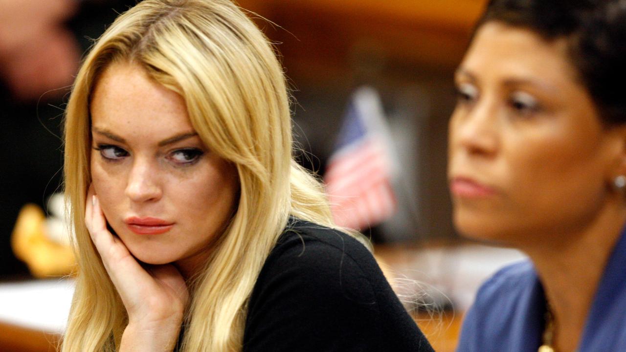 Lohan and her lawyer during court proceedings in 2010. Picture: AP