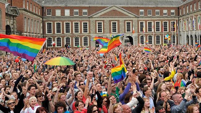Thousands celebrate the same-sex marriage vote at Dublin Castle in Ireland in 2015. Picture: Clodagh Kilcoyne/Getty Images.