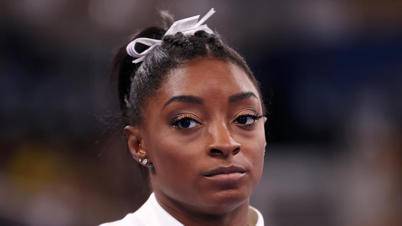 Simone Biles of Team United States looks on during the Women's Team Final on day four of the Tokyo 2020 Olympic Games.