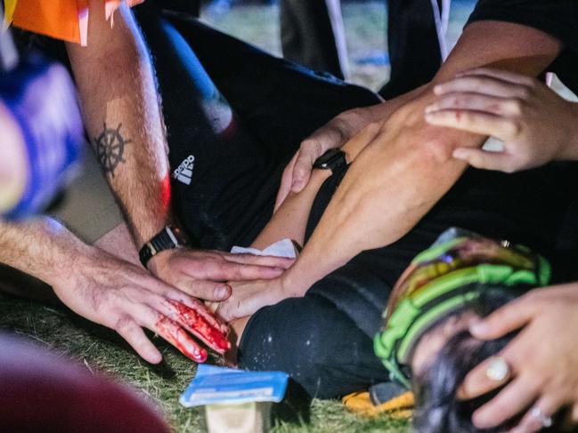 People attend to a wounded person, during a clash with law enforcement in Kenosha, Wisconsin. Picture: Getty Images/AFP