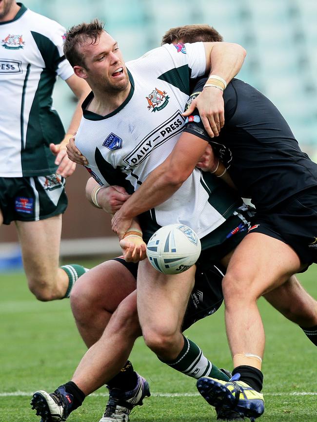 St Marys Tom Eisenhuth charges at the Mounties defence. Picture: Justin Sanson