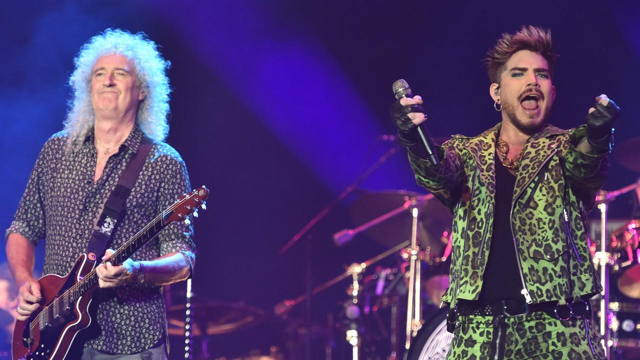 Queen and Adam Lambert have signed two guitars for a Fire Fight global auction. Picture: PETER PARKS/AFP.