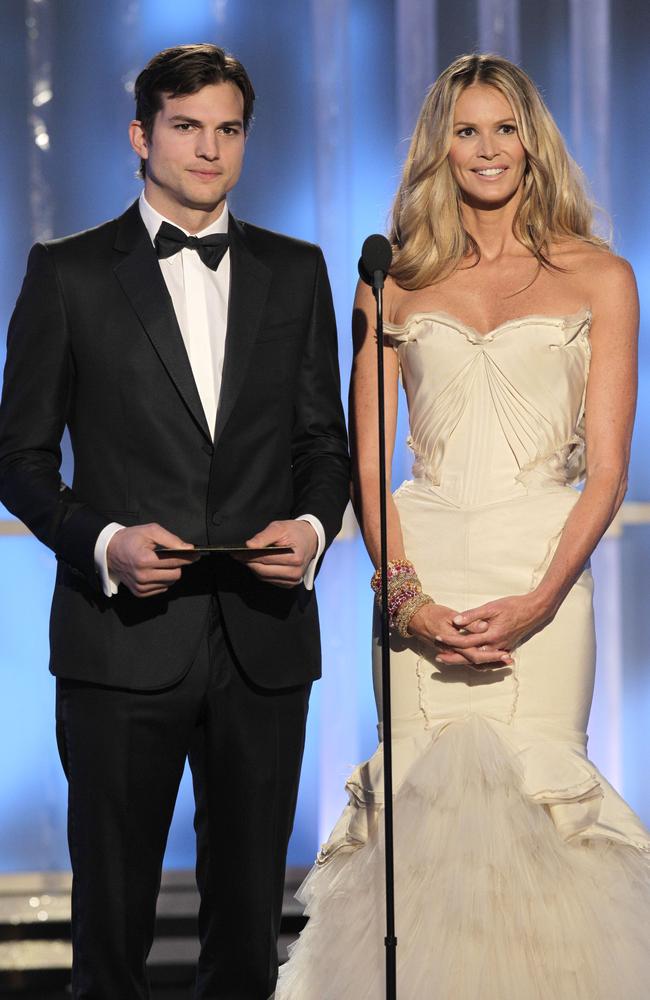 Elle appears alongside actor Ashton Kutcher at the Golden Globe Awards in 2012. Picture: Paul Drinkwater/NBC/Getty Images