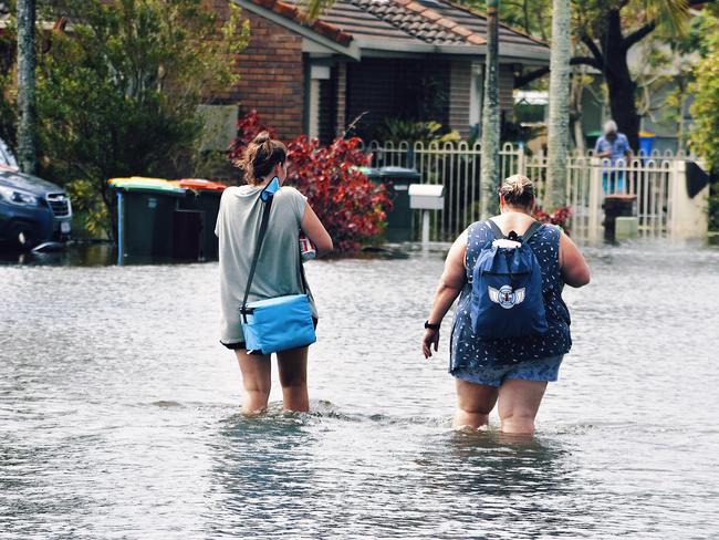 Residents flee West Ballina after torrential rain causes flash flooding in 2022. Picture: Tessa Flemming.