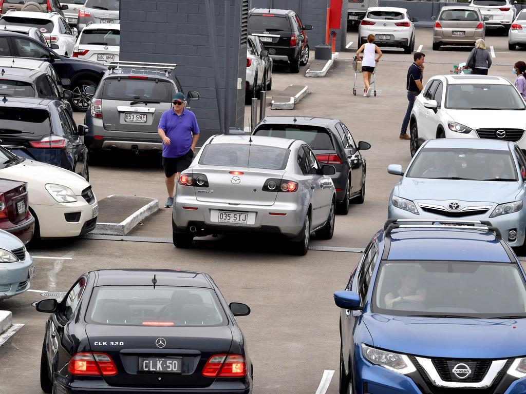 The Greenslopes shopping centre carpark quickly filled up. Picture: NewsWire / John Gass POOL via NCA NewsWire